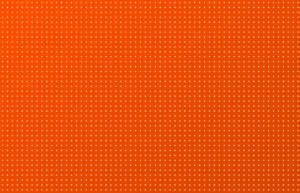 Abstract orange halftone graphic representing performance